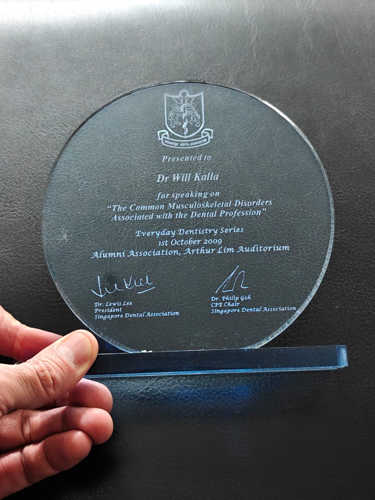 Singapore Dental Association 2009 speaker plaque presented to Dr Will Kalla for a lecture on musculoskeletal disorders in the dental profession